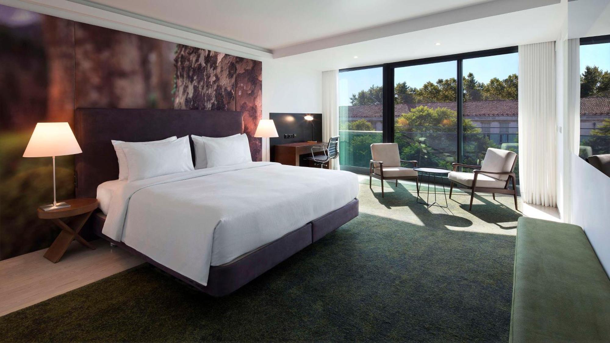 Deluxe Zimmer mit Kingsize-Bett