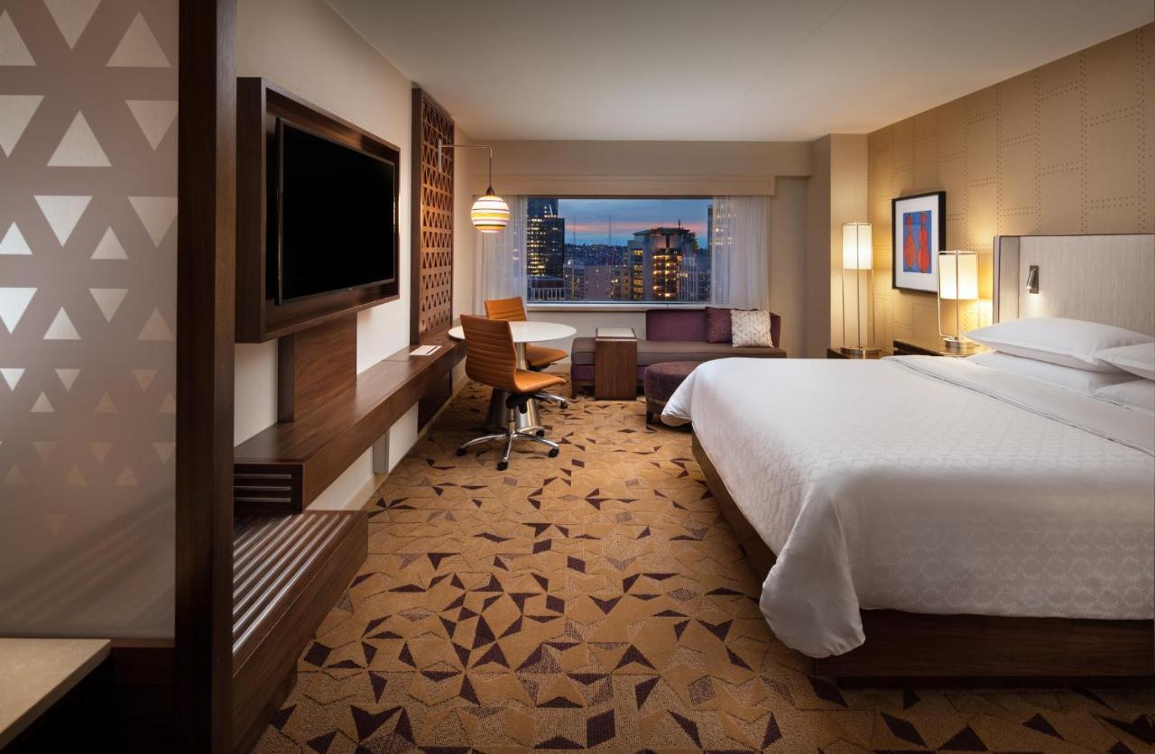 Premium Zimmer mit 1 Kingsize-Bett und Zugang zur Club Lounge – obere Etage