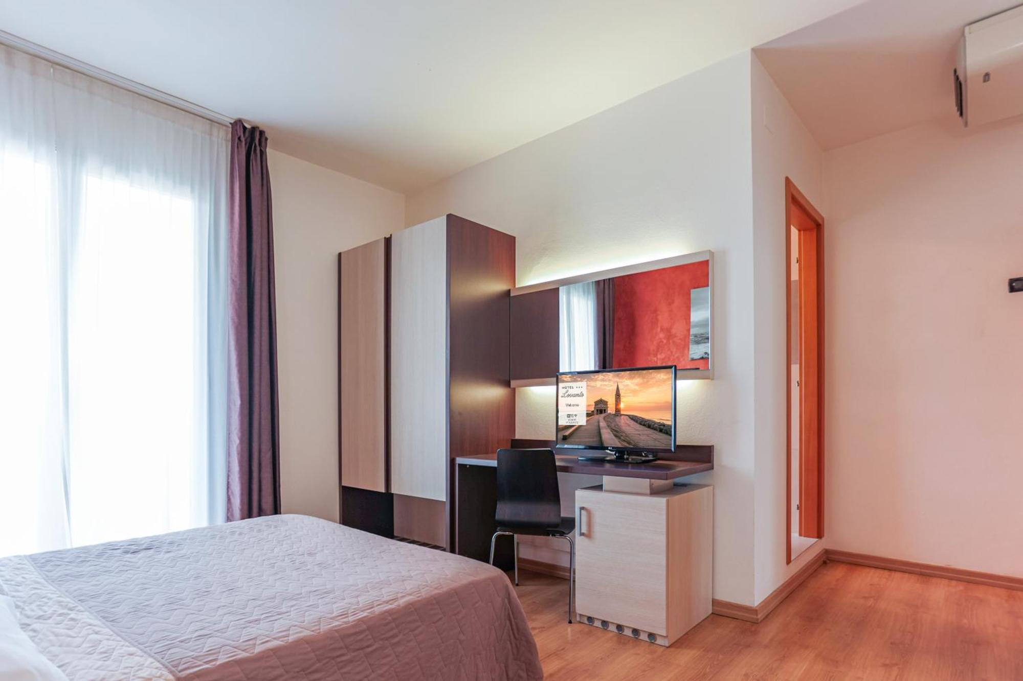 Dreibettzimmer mit Balkon