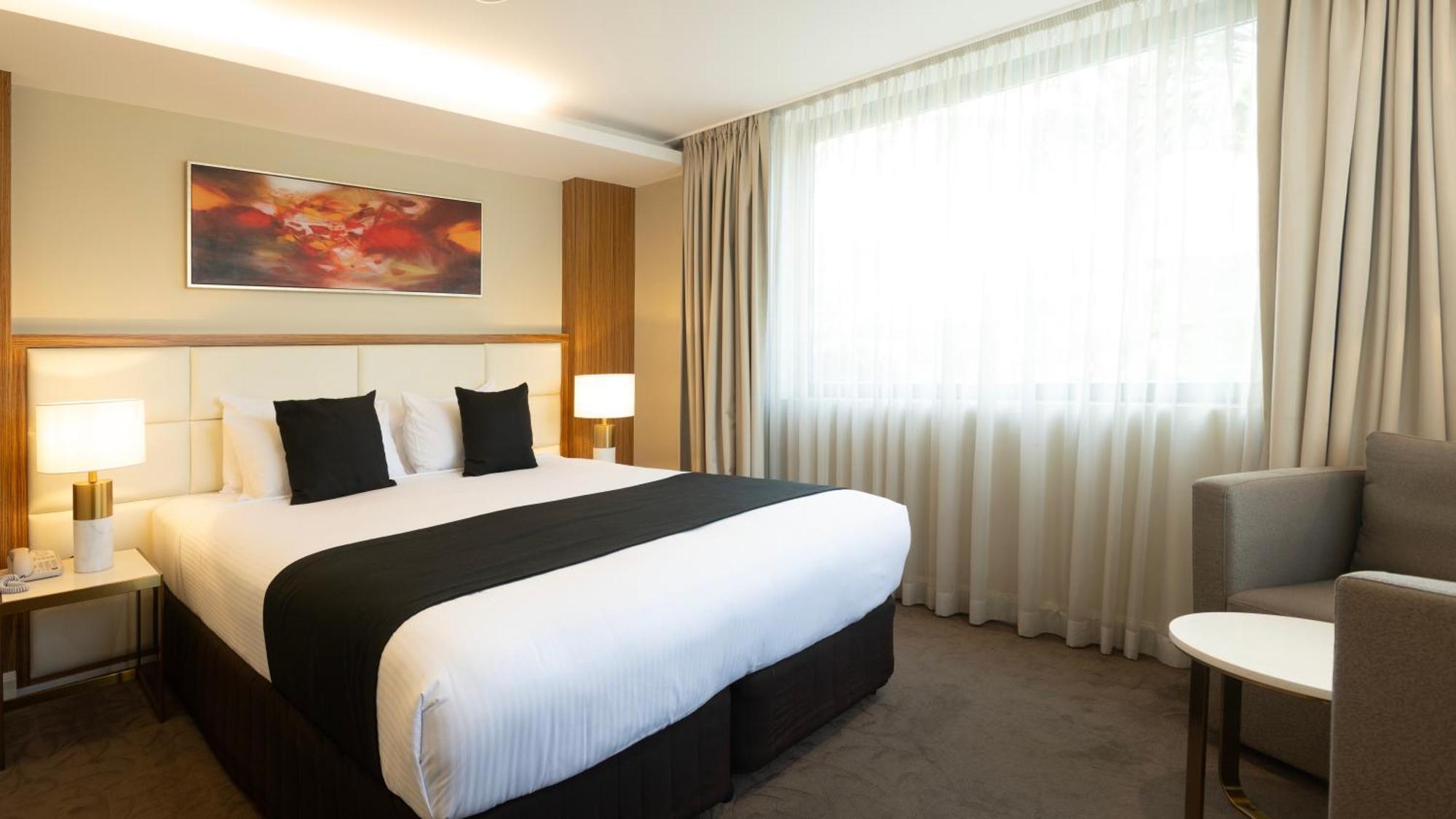 Deluxe Zimmer mit Kingsize-Bett