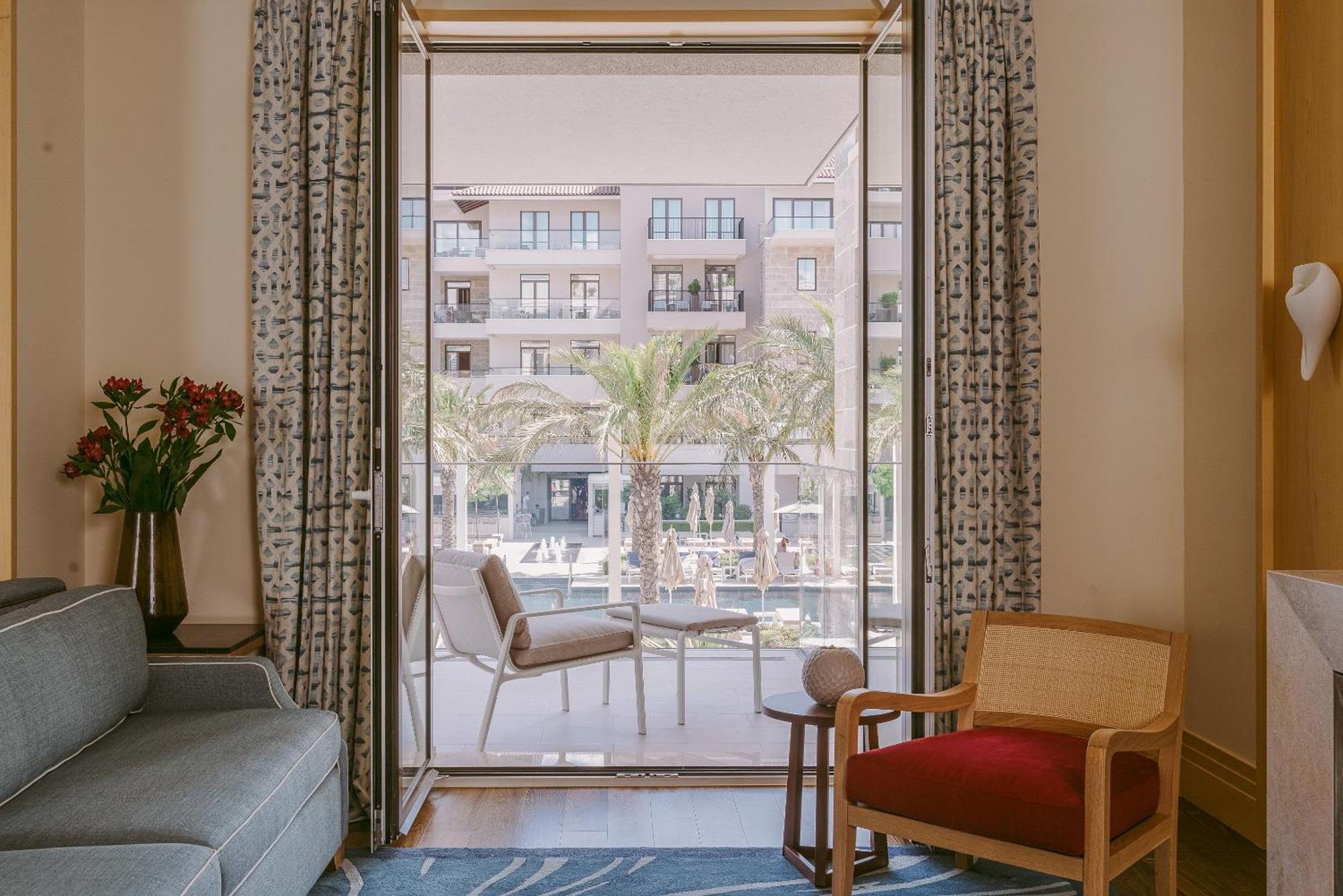 King Studio Suite with Balcony and Pool View,1639580344:JPEG