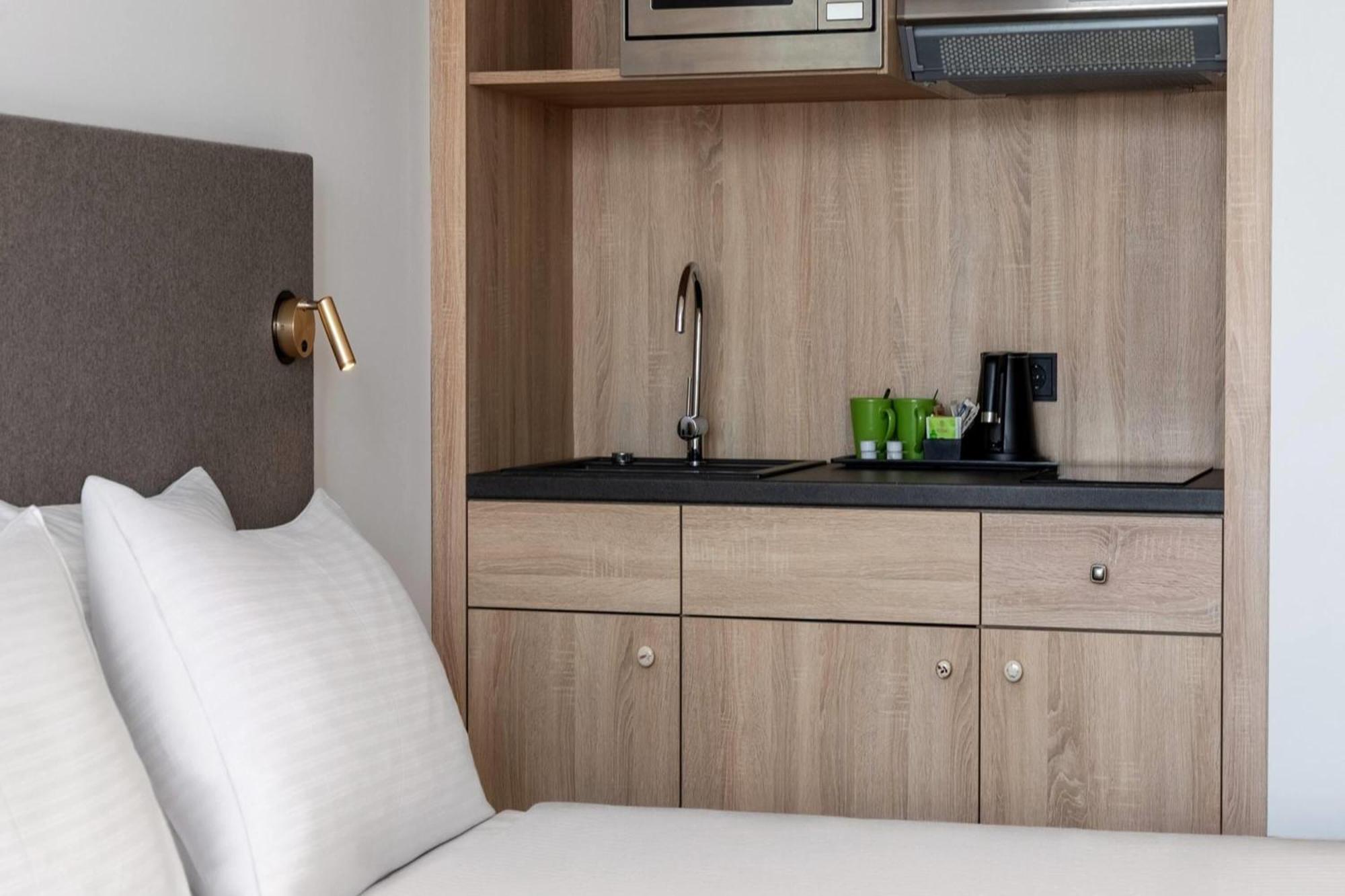 Superior Zweibettzimmer mit Küchenzeile und Balkon - Nichtraucher
