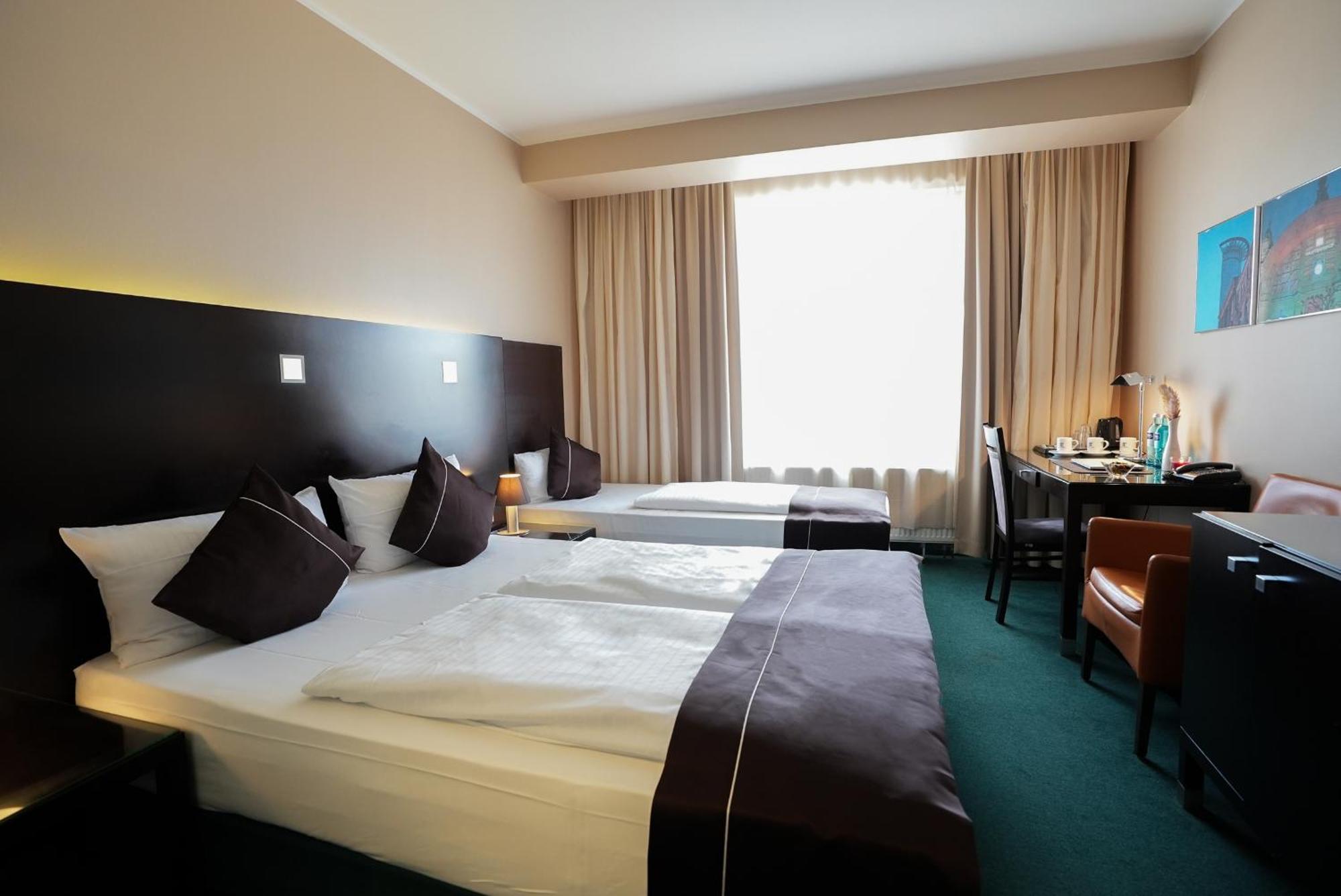 Dreibettzimmer