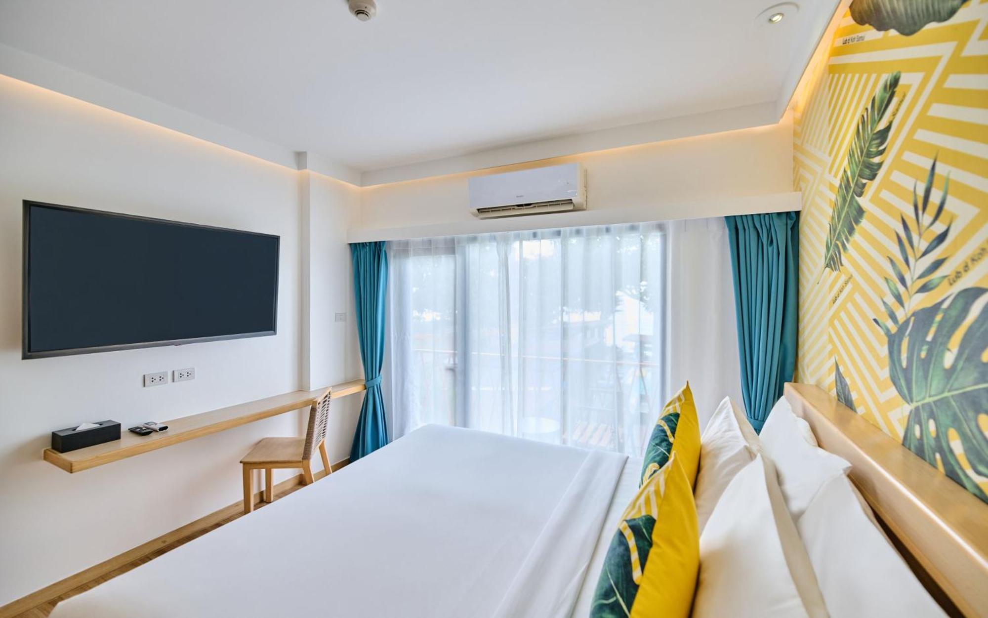 Deluxe Zimmer mit Kingsize-Bett und Meerblick