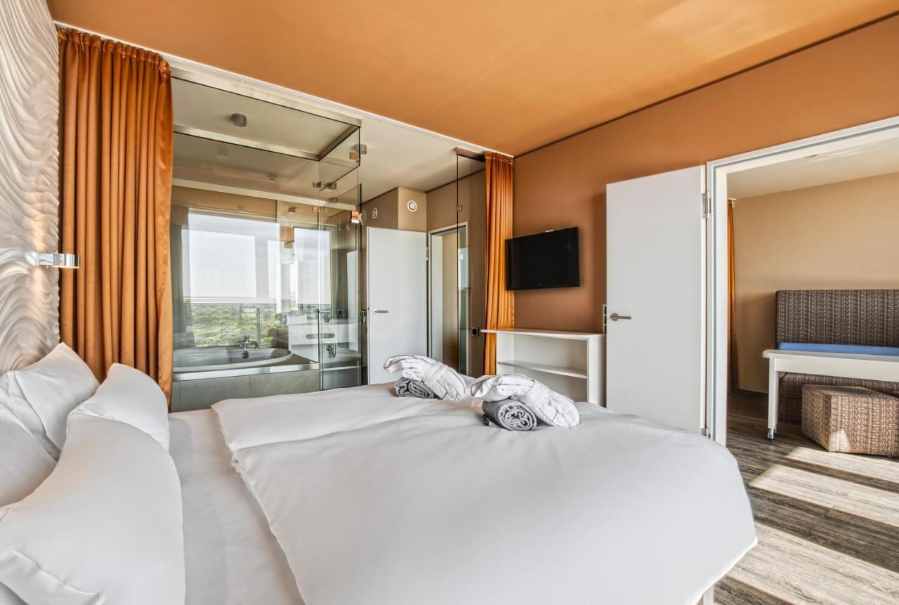 Suite seitlicher Meerblick mit Balkon,930486820:JPEG